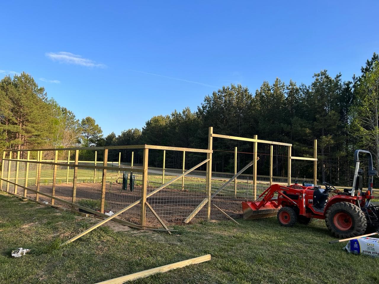 Garden enclosure build under blue sky