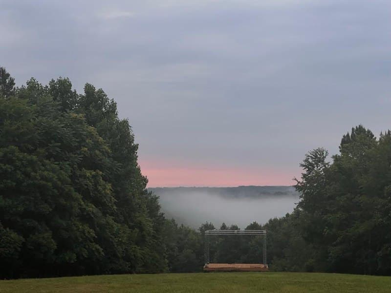The stage at Forevermore Farm looking over the frost-covered valley